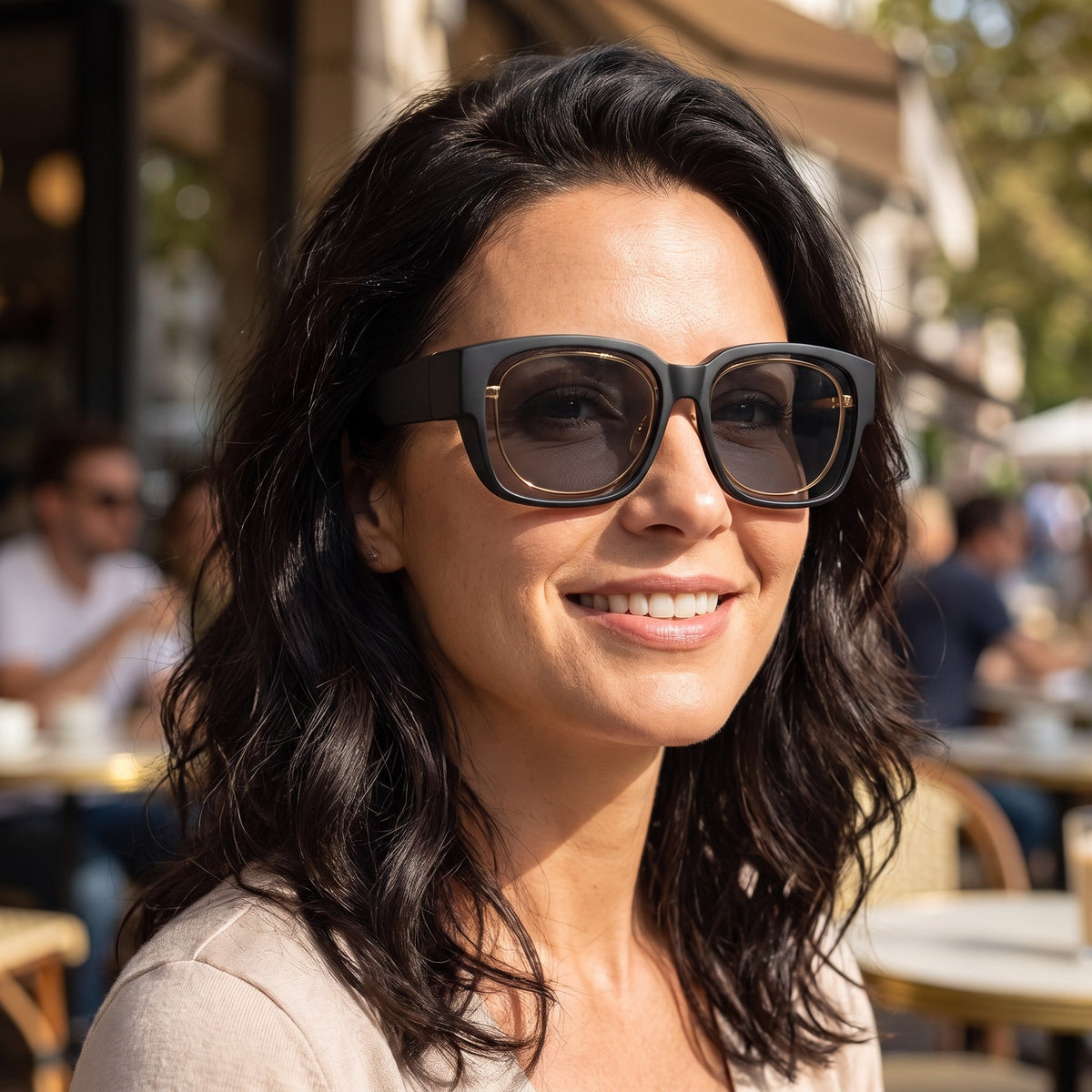 Woman wearing OverShade fit-over sunglasses over her glasses